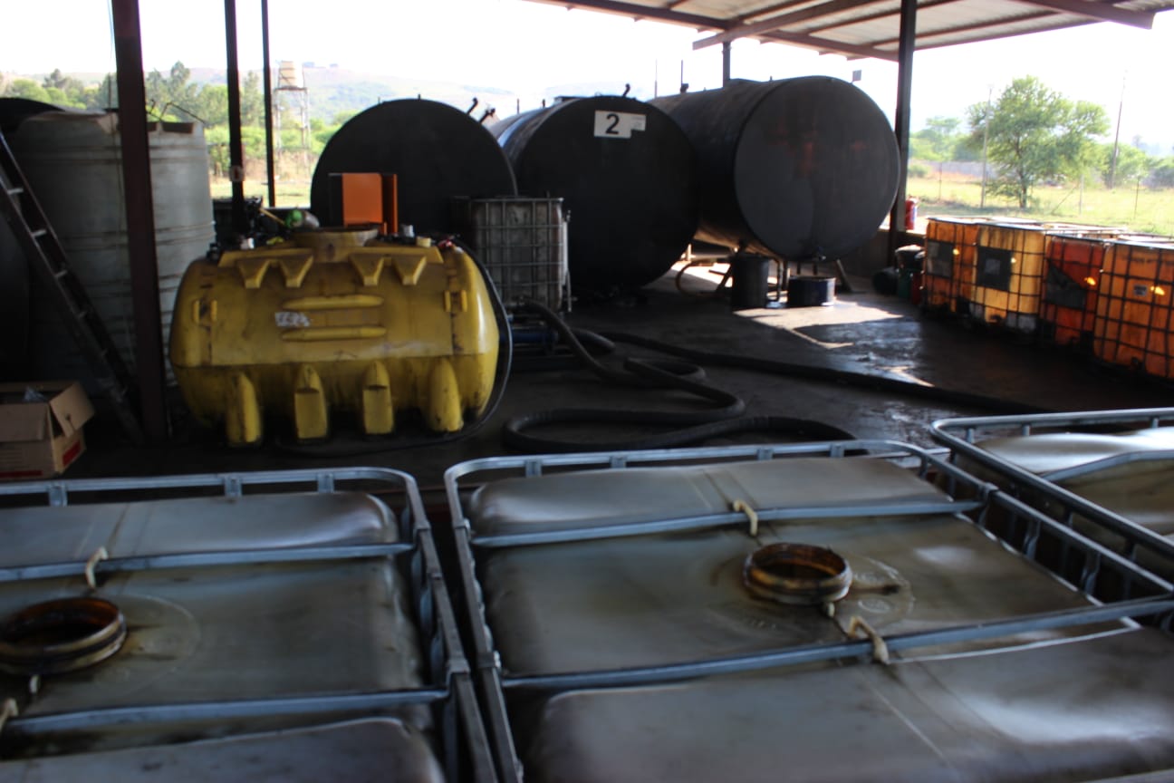 Oil storage tanks and containers at the Old Oil Boys depot