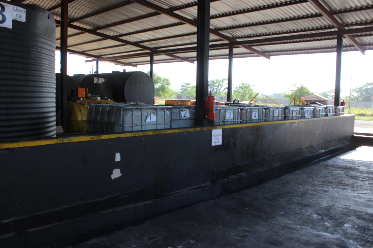 Oil containers inside the Old Oil Boys depot